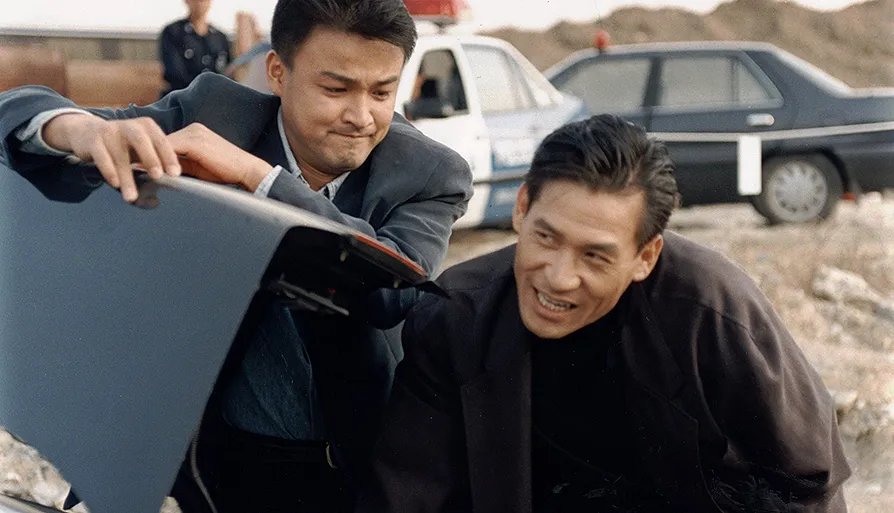 安圣基（右）与朴重勋在《特警冤家》搭档，一口气夺下百想及大钟奖影帝、百想年度大奖。剧照