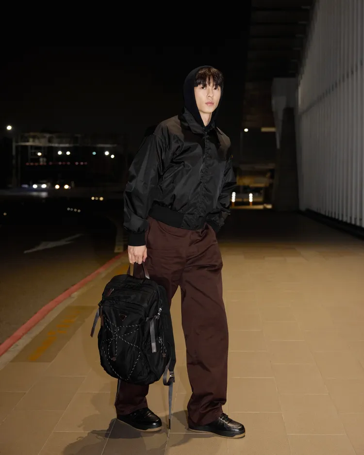 許光漢飛往米蘭，將出席PRADA 2026秋冬男裝秀。品牌提供