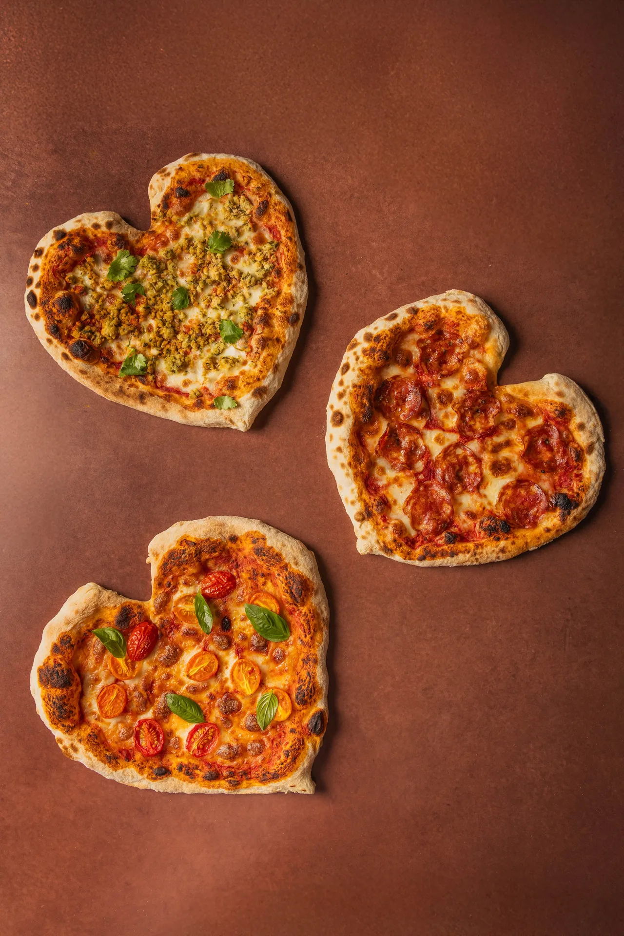 ZIGA ZAGA「有夠義思半自助饗宴」限時推出情人節主題，心型義式窯烤披薩吃到飽，每位2980元起。台北君悅酒店提供