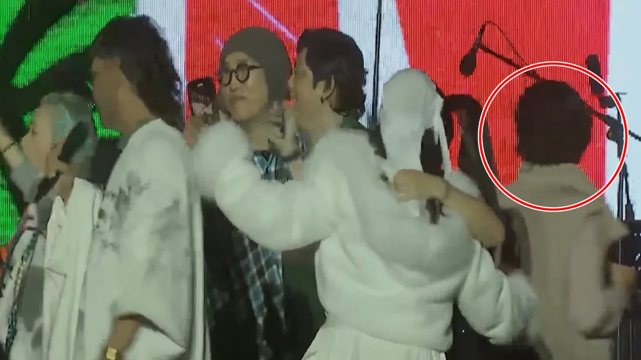 大家還在狂歡時，饒慶鈴（紅圈處）悄然轉身離去。翻攝自YouTube