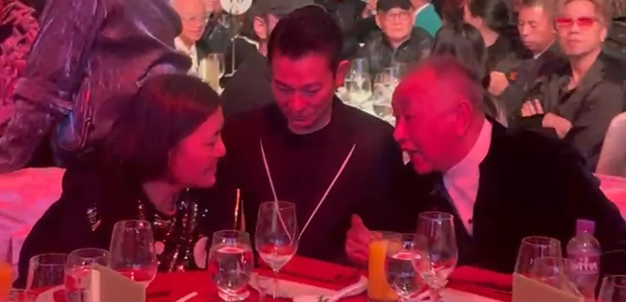 寬姊與劉德華等人聊天。