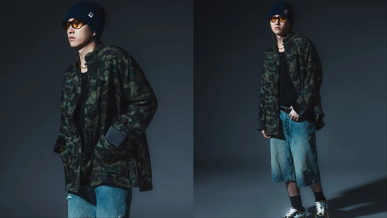 「絲綢唐裝外套」外層採用光澤感十足的絲質緹花，結合疊印技術展現漸層迷彩效果。品牌提供