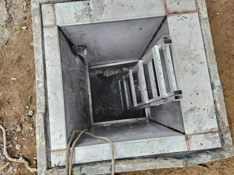 涵洞疑因空氣不流通，導致2名工人暈倒。翻攝照片