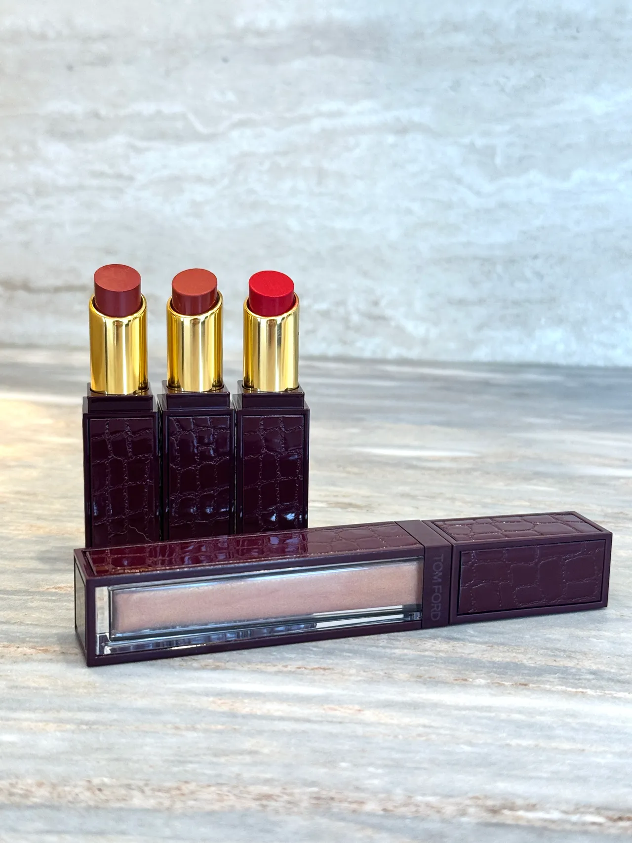 TOM FORD情慾無花果限定版設計師絲絨霧光唇膏，各2200元；情慾無花果限定版設計師奢華水唇萃，2200元。張家玲攝