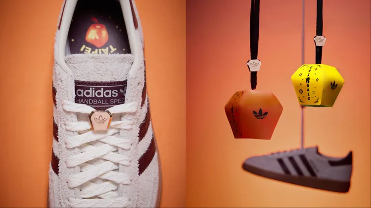 HANDBALL SPEZIAL鞋帶附有金色天燈扣飾，鞋舌內側隱藏手作摺紙小天燈。品牌提供