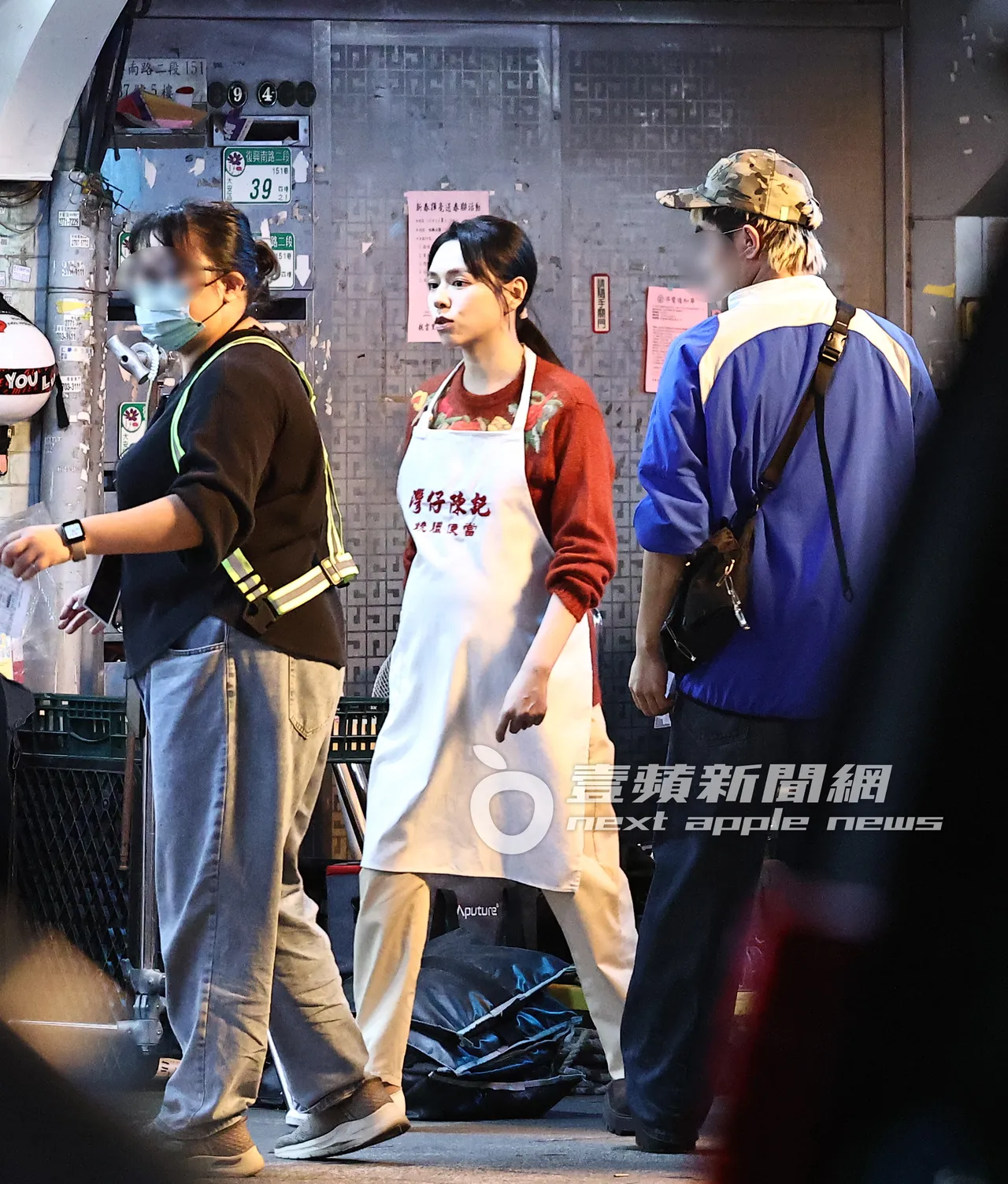 夏于喬圍裙下孕肚微微隆起。特勤中心攝