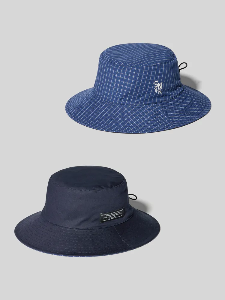 GU x UNDERCOVERDRY雙面漁夫帽，590元。品牌提供