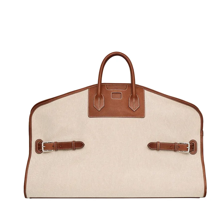 Porte-habits Long Courrier 提包，H 帆布與Barénia Faubourg小牛皮材質，140萬元。品牌提供