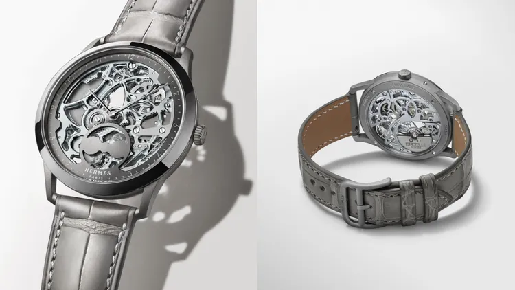 Slim d'Hermès Squelette Lune鏤空月相腕錶，39.5mm，五級鈦金屬錶殼，鏤空與放射紋打磨的煤灰色錶盤，霧面錫灰色或黑色短吻鱷魚皮，H1953鏤空超薄自動上鍊機芯，動力儲存48小時，防水深度30米。品牌提供