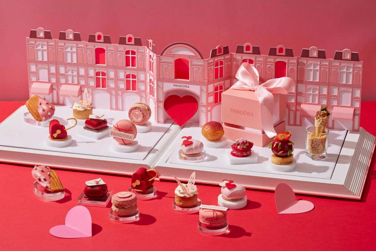 「甜蜜艾語」雙人下午茶同樣運用愛心、蝴蝶與粉紅元素堆疊出浪漫氣息。台北寒舍艾美酒店提供