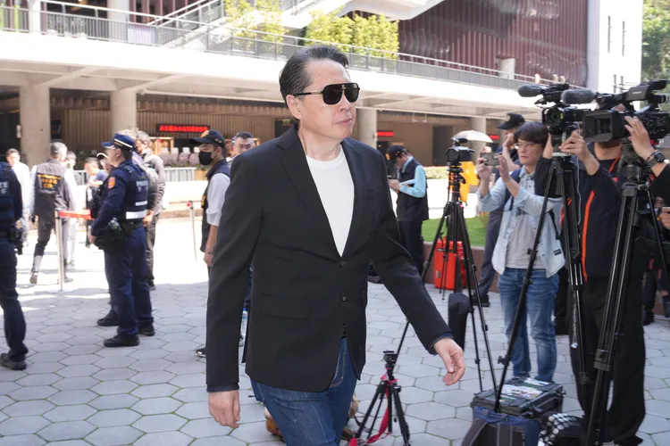 歐陽龍現身告別式。彭欣偉攝