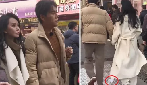 伊能靜陪秦昊回瀋陽老家街頭牽手放閃！大衣沒剪吊牌被虧慘