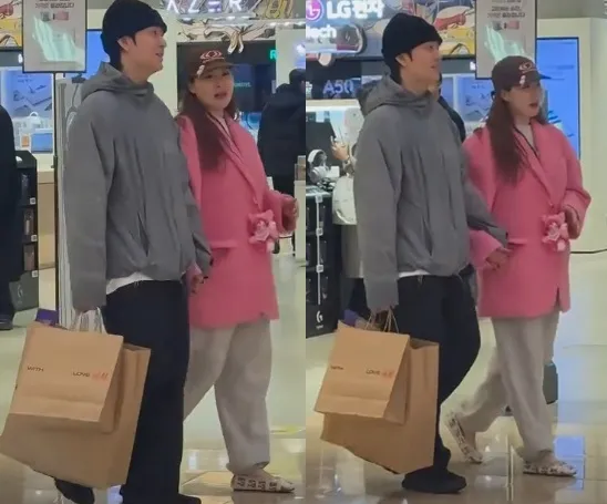 泫雅17日跟龍俊亨在購物中心逛街，身形看起來大了一號，引發網友猜測是否肚皮有喜。翻攝論壇