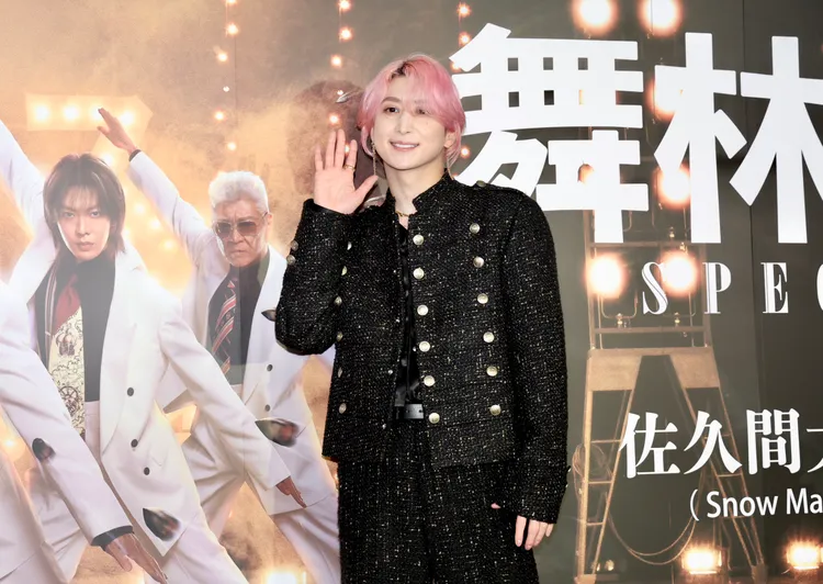 佐久間大介揮手打招呼。莊宗達攝