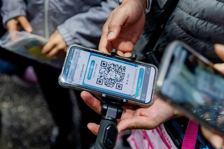 高雄數位市民活動報名系統使用手機掃碼快速通關。翻攝畫面