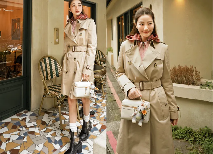 許路兒在風衣內疊穿連帽外套，更有隨性感。品牌提供