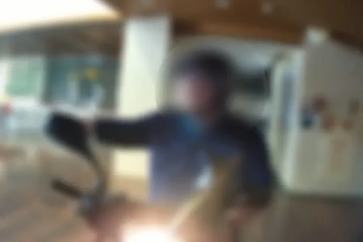 田山盛國騎車闖入法務部。警方提供