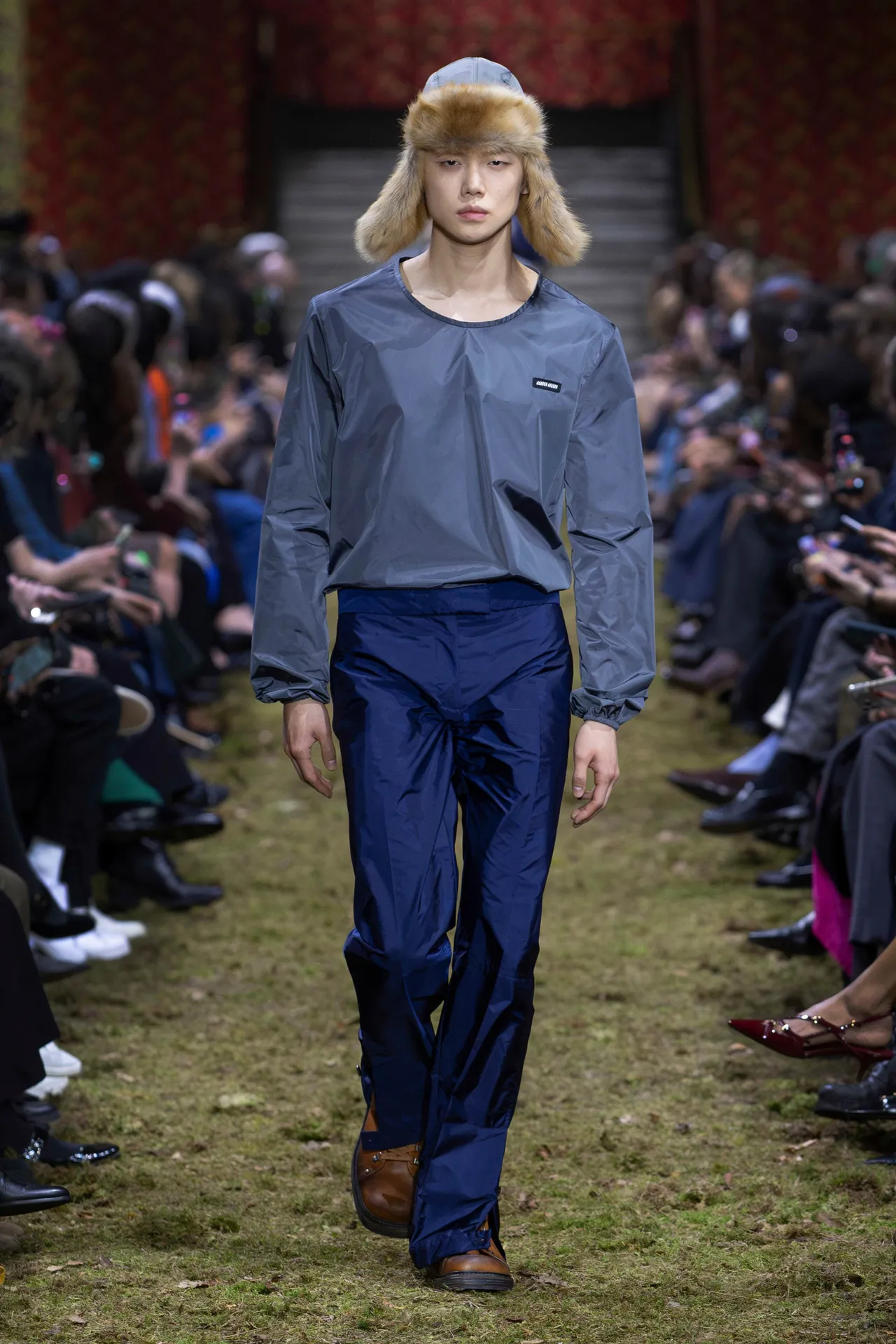韓團TXT成員崔然竣，驚喜獻身為Miu Miu秋冬大秀走秀。品牌提供