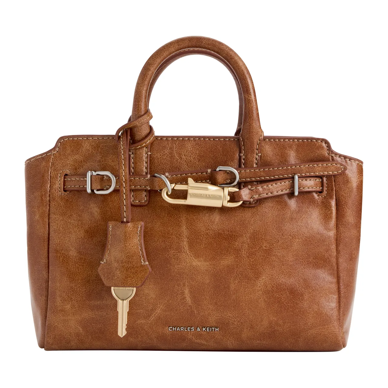 CHARLES & KEITH Delfina小型鎖頭手提包，2990元。品牌提供