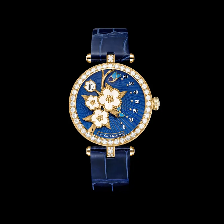 梵克雅寶Lady Lucky Spring Butterfly腕錶，黃K金、琺瑯、白色珍珠母貝、鑽石。品牌提供