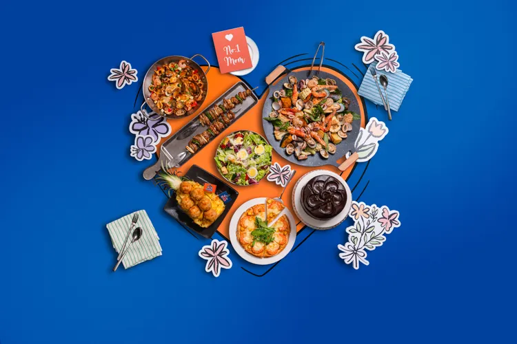 SPORTS NATION運動餐廳母親節套餐結合BAC經典巧克力蛋糕、康乃馨、拍立得全家福與現場告白橋段，讓節日聚餐更添互動感與紀念價值。SPORTS NATION運動餐廳提供