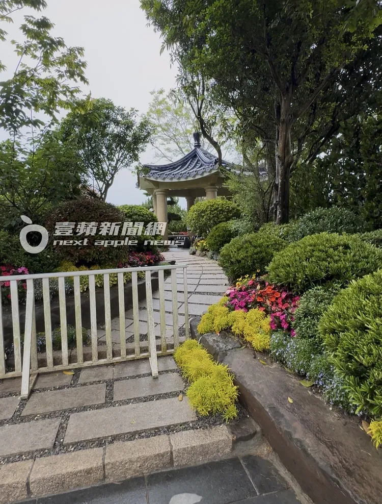 永真園環境幽靜，石板步道領著視野望向涼亭，供來客休憩乘涼。特勤中心攝
