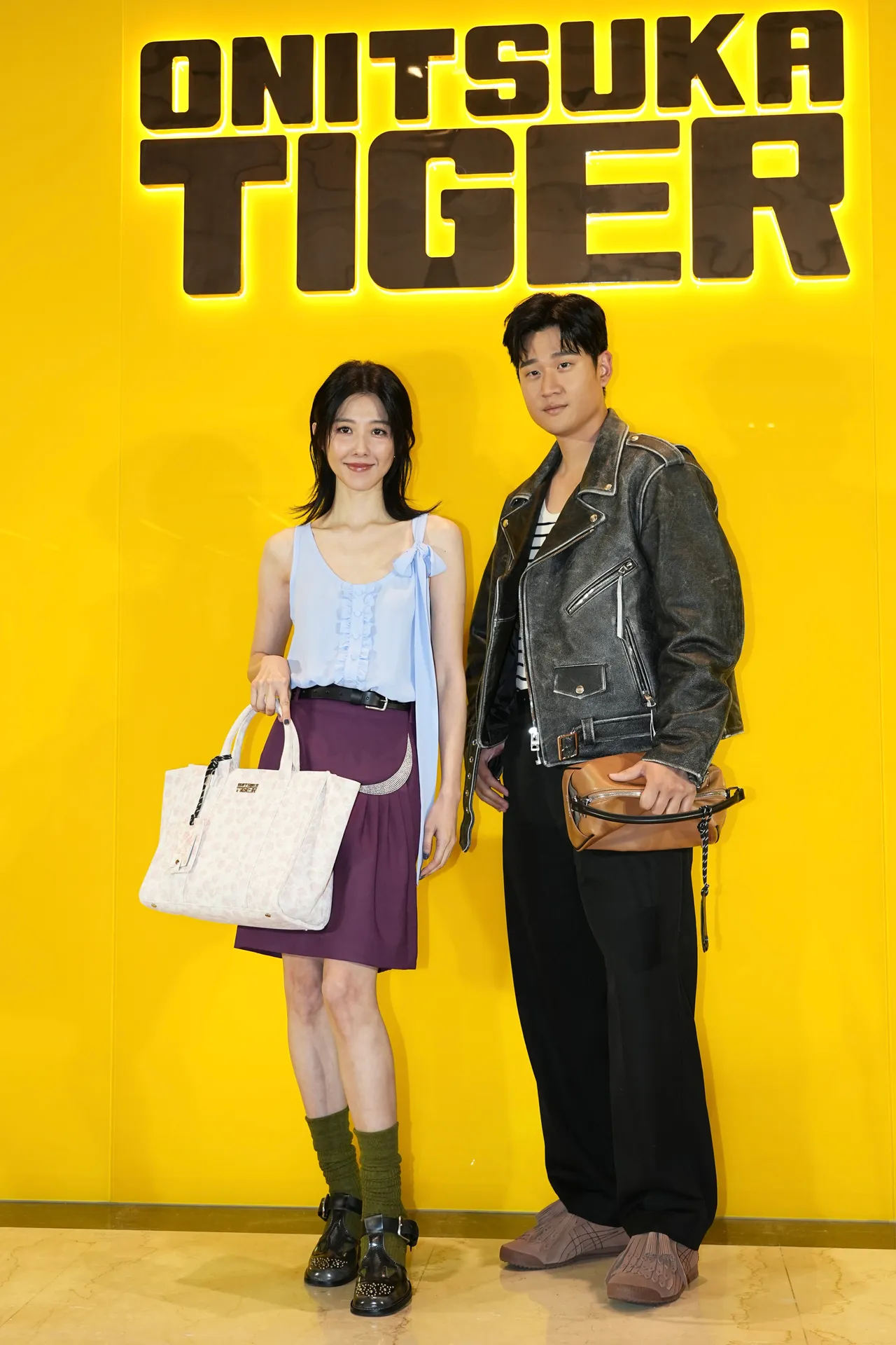 邵雨薇（左）與周興哲今日出席鬼塚虎微風南山概念店開幕活動。彭欣偉攝