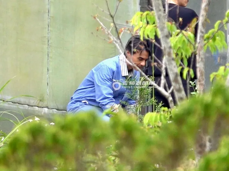 馮德倫蹲在一旁休息片刻。特勤中心攝