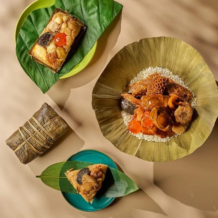 以江浙菜聞名的江南春餐廳，今年推出「古早味飄香粽」、「辣味犇粽」與「滬式鮑魚干貝粽」三款手工粽，兼具經典和創新風味。業者提供