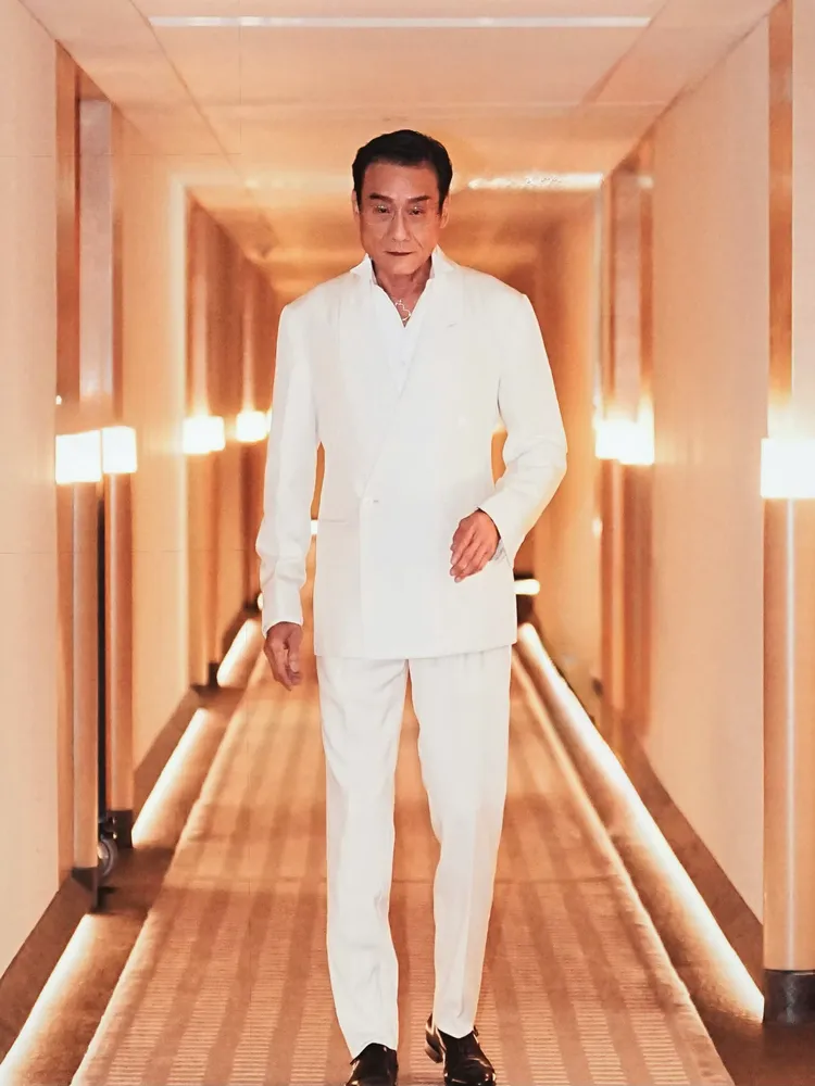 Qeelin葫蘆珠寶襯托出梁家輝的影帝魅力。品牌提供