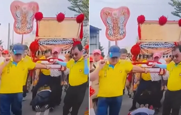 扶轎的黃衣男站在大甲媽祖鑾轎正前方，張開雙腿讓鑽腳底的信眾從其胯下通過，引起網友不滿。翻攝「黑色豪門企業」