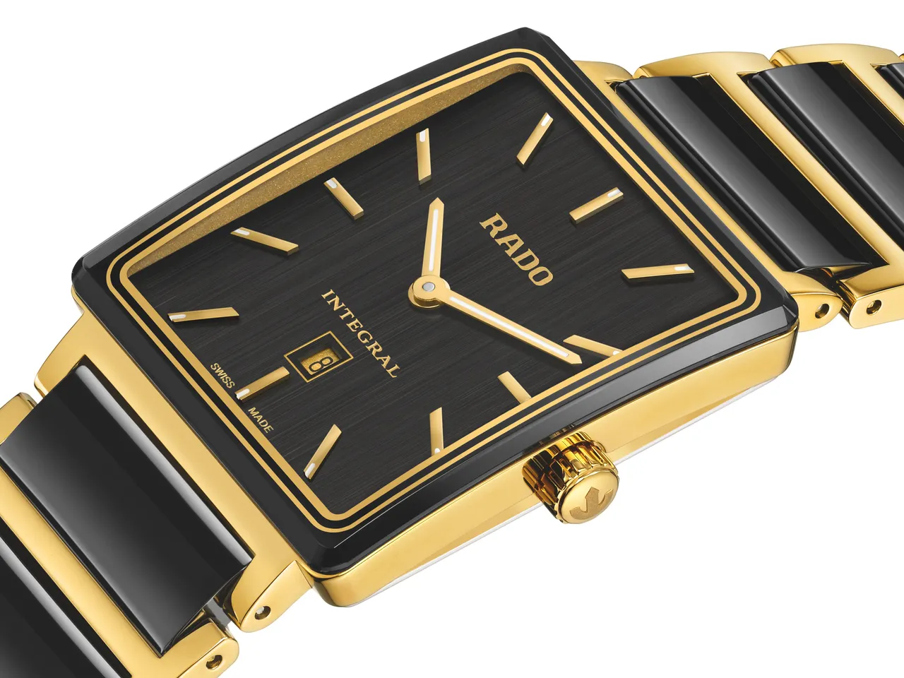 RADO Integral精密陶瓷系列40周年紀念版腕錶，採用黑色垂直拉絲錶盤搭配黃金色時標。品牌提供