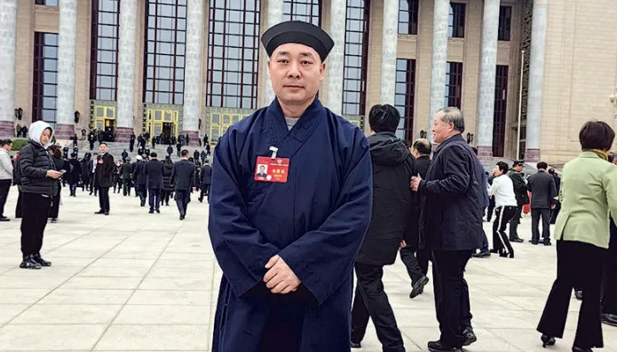 身兼政協委員的胡誠林多次代表道教赴北京開會。翻攝微博/陝西省道教協會會長胡誠林