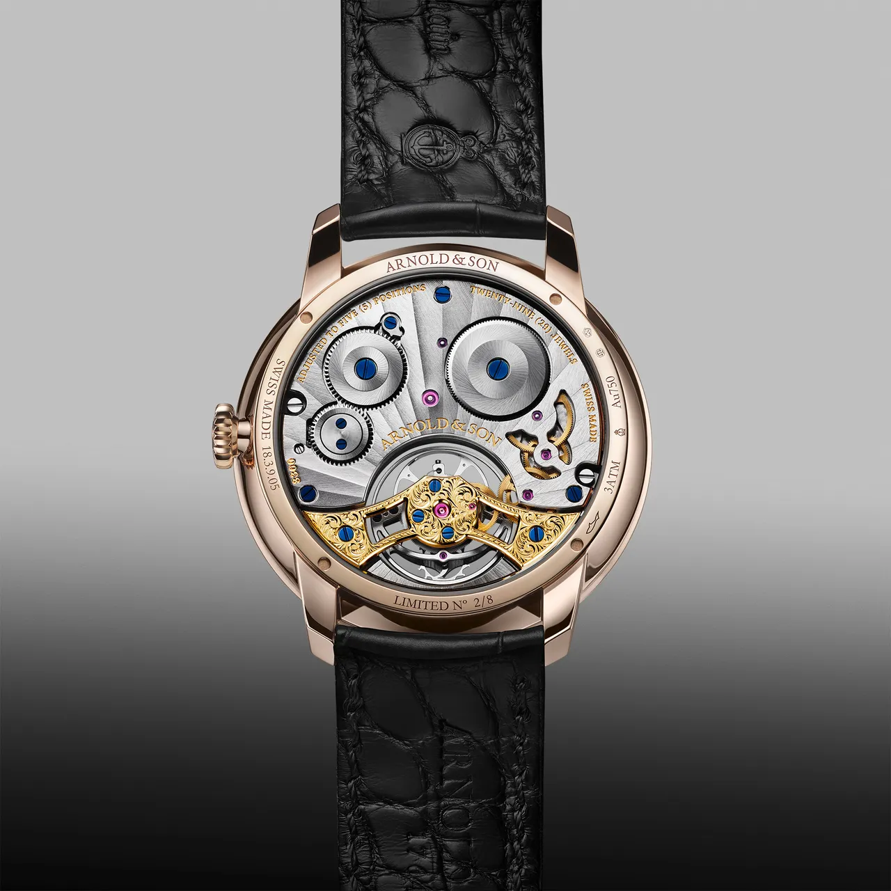 Arnold & Son Ultrathin Tourbillon縞瑪瑙超薄陀飛輪腕錶，41.5mm，18K（5N）紅金錶殼，黑色縞瑪瑙（拋光與霧面處理）錶盤，黑色短吻鱷魚皮錶帶（內襯黑色短吻鱷魚皮），A&S8300手動上鍊機械機芯，動力儲存100小時，防水深度30米，限量8只，7萬4600瑞士法郎 (約299萬元台幣)。 品牌提供