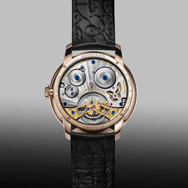 Arnold & Son Ultrathin Tourbillon縞瑪瑙超薄陀飛輪腕錶，41.5mm，18K（5N）紅金錶殼，黑色縞瑪瑙（拋光與霧面處理）錶盤，黑色短吻鱷魚皮錶帶（內襯黑色短吻鱷魚皮），A&S8300手動上鍊機械機芯，動力儲存100小時，防水深度30米，限量8只，7萬4600瑞士法郎 (約299萬元台幣)。 品牌提供