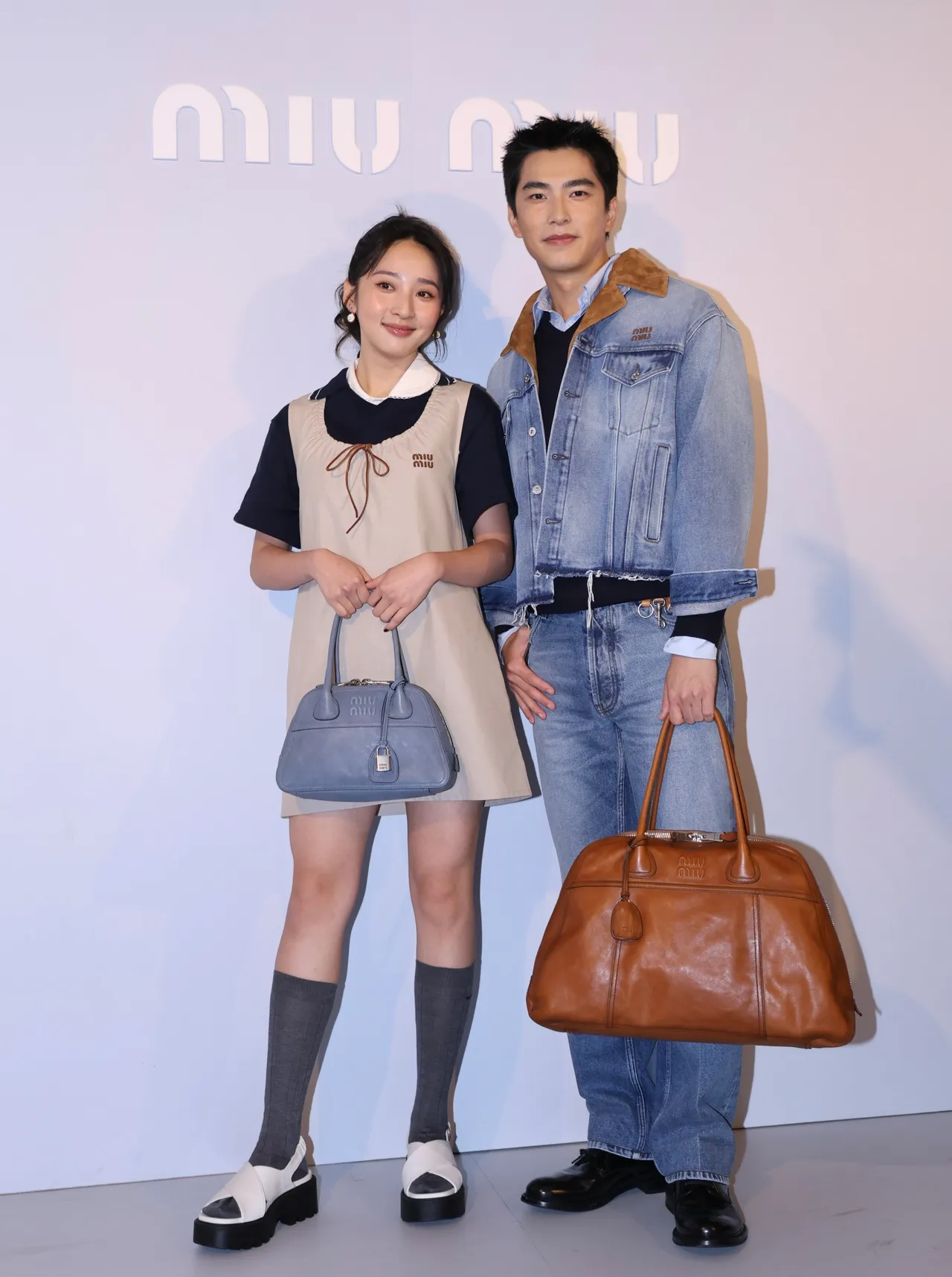 李沐（左）、曾敬驊（右）出席Miu Miu新店開幕活動。莊宗達攝