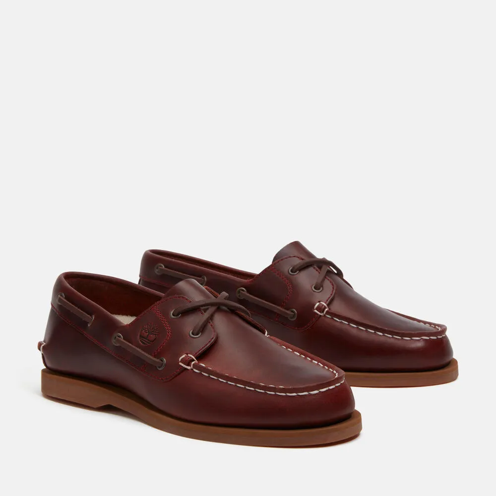 Timberland女款酒紅色經典兩孔帆船鞋，5500元。品牌提供