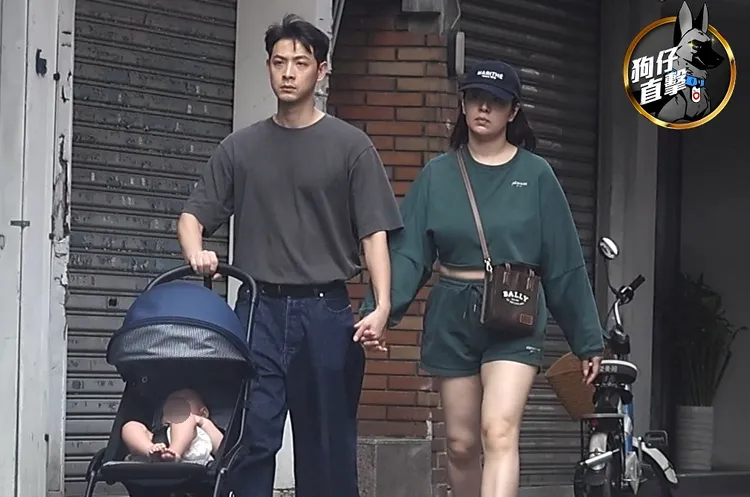 連晨翔一手牽著愛妻劉品言，一手推著女兒，全家出動逛東區。特勤中心攝