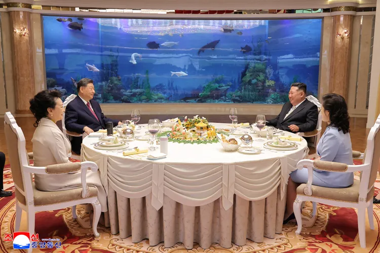 金正恩夫婦設宴款待習近平夫婦。路透社