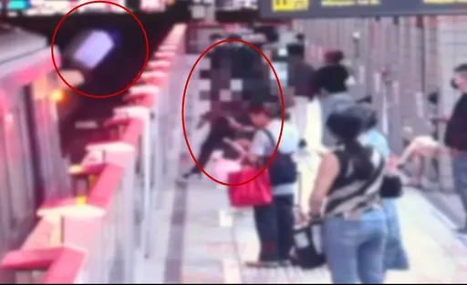 夫妻吵到捷運停擺！印尼男怒丟行李箱落軌阻列車　竹圍站驚魂瞬間曝