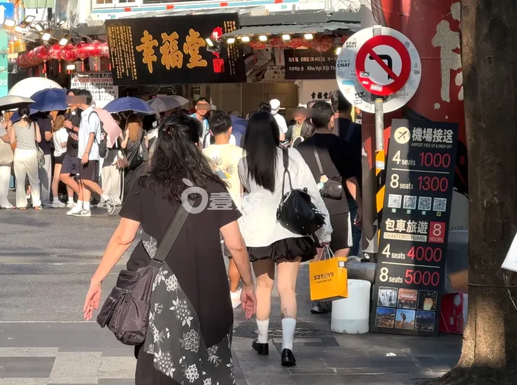 許允樂往捷運西門站走去。特勤中心攝
