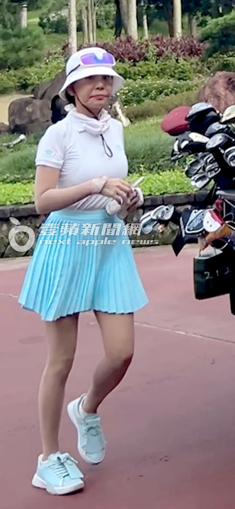 2025/7/30，謝女年約50歲，身形圓潤，法令紋明顯，被球友爆料離過兩次婚。特勤中心攝

