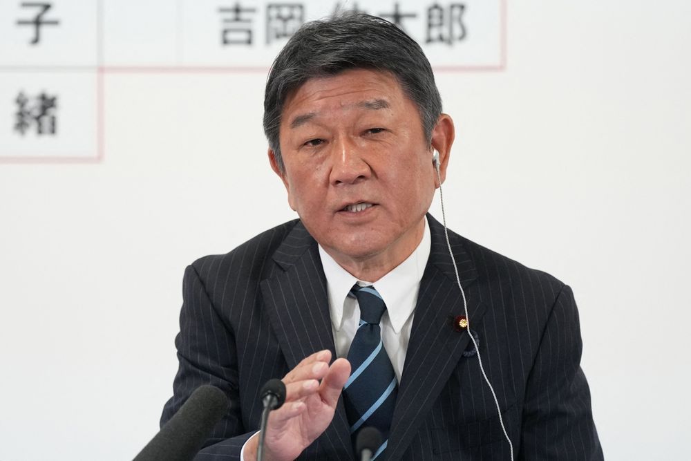 舉起的拳頭放下了?中日外長互動陷羅生門 他分析尷尬真相