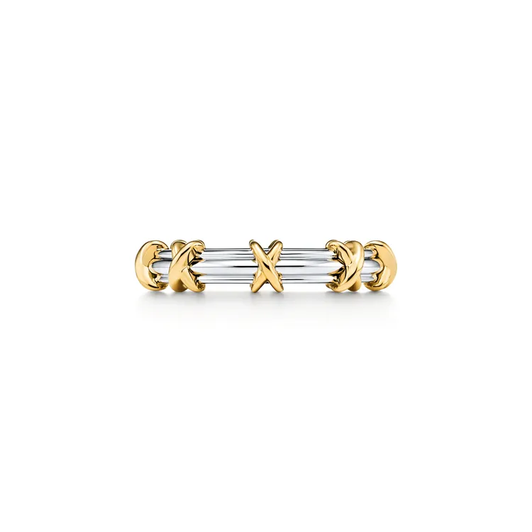 Tiffany Sixteen Stone系列結婚戒指，鉑金與黃K金，寬3mm。品牌提供