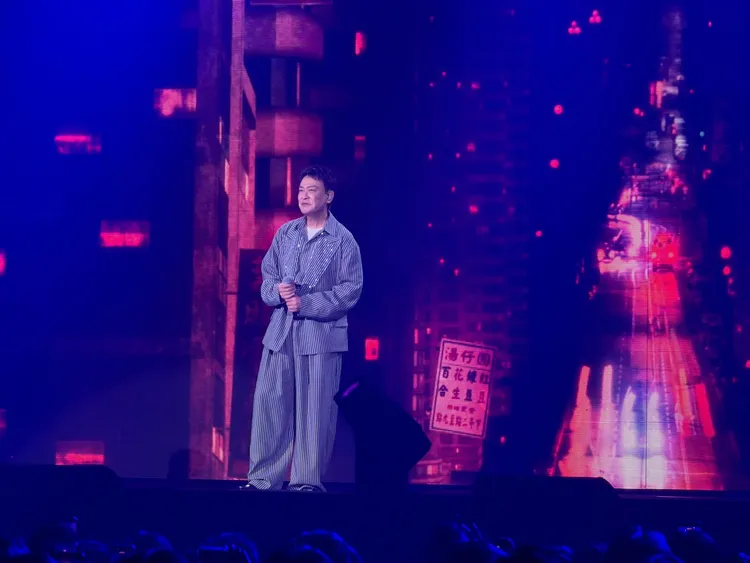 王識賢接連獻唱個人經典代表作《勝者為王》、《一片天》。讀者提供