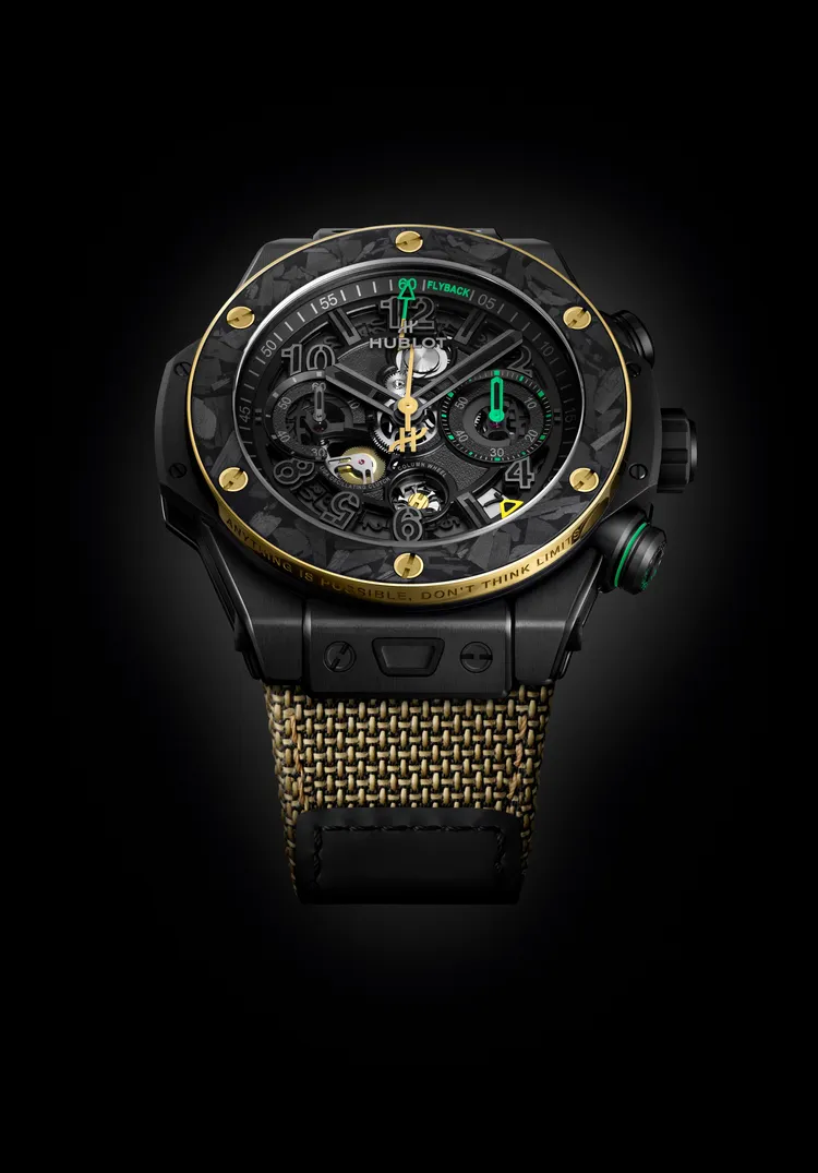HUBLOT Big Bang Reloaded Usain Bolt限量計時碼錶，44mm，緞面打磨與拋光黑陶瓷錶殼，緞面與霧面鍍黑鏤空錶盤，黃金色彩織物錶帶搭配魔鬼氈（附黑黃綠三色迷彩橡膠錶帶），HUB1280 UNICO自製自動上鍊飛返計時機芯，動力儲存72小時，防水深度100米，限量200只，88萬8000元。品牌提供