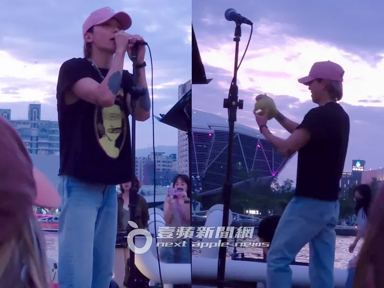 李洪基喜拿粉絲送上的柚子，把柚子皮戴在客座吉他手頭上。讀者提供