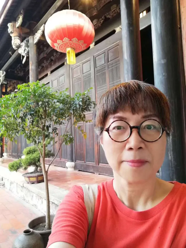 黃偉哲的妹妹黃智賢。翻攝其臉書