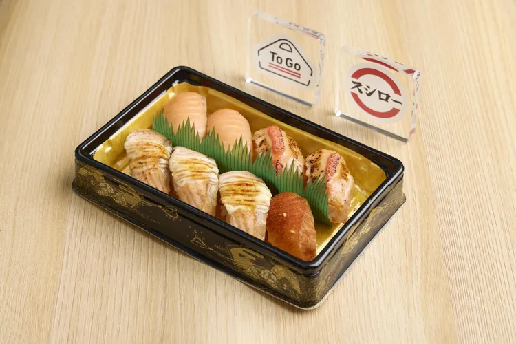 TOGO站前店餐盒鮭魚極．八味255元。業者提供