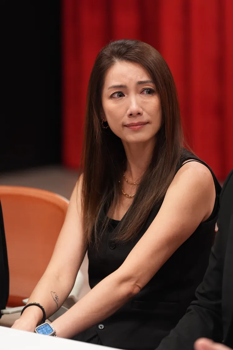 林韋君努力平復情緒。攝影中心攝